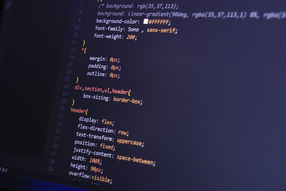 A computer screen displaying lines of CSS code with various style rules for web design, including background color, font settings, margins, padding, and border styles. The code is color-coded with syn